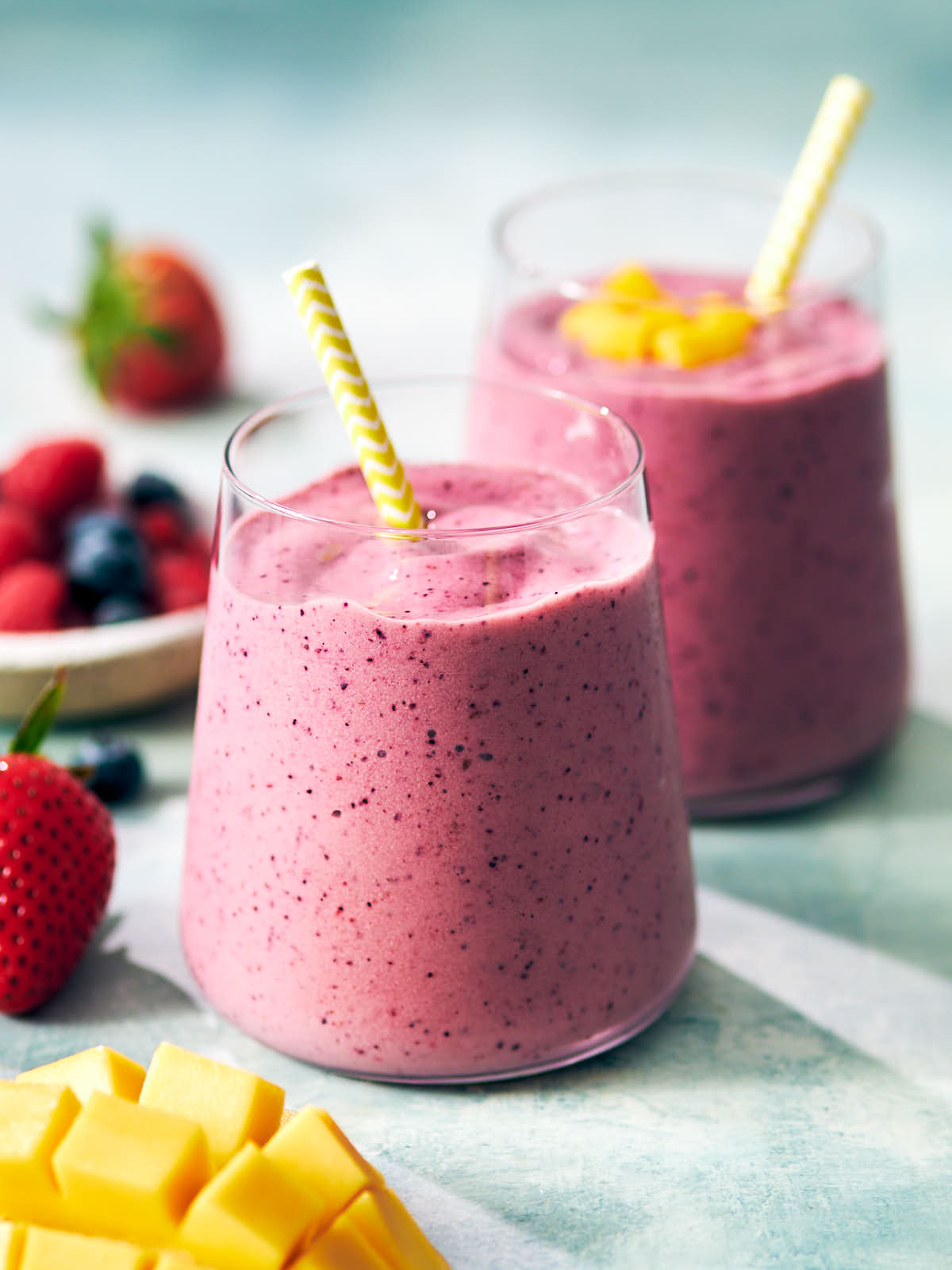 smoothie by blending fruits, vegetables, superfoods, and proteins in